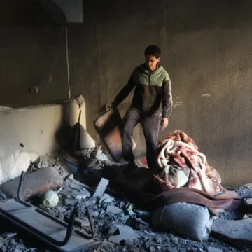 Father and son buried together in an Israeli strike that killed dozens in Gaza