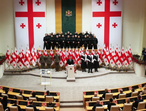 New Georgian president sworn in; predecessor says he is not legitimate leader