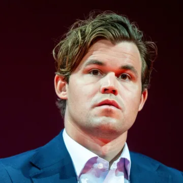 241230-magnus-carlsen-vl-202p-ac6d1b.jpg Chess champion returns to tournament after being fined for wearing jeans