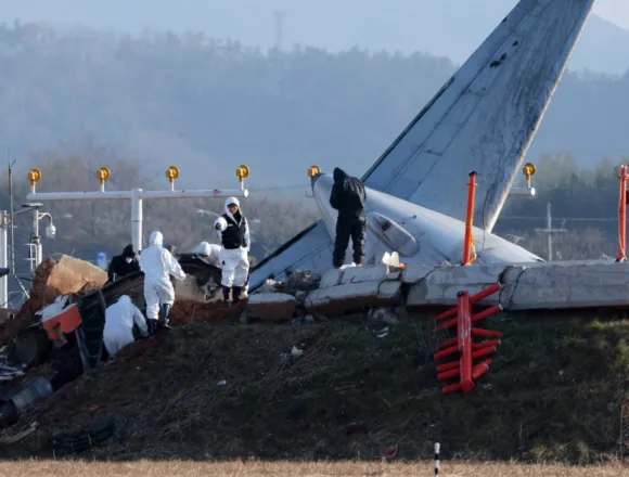 Investigators turn to black boxes for answers in South Korea plane crash