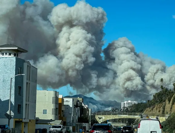 Wind-whipped fire in L.A. prompts evacuations in Pacific Palisades