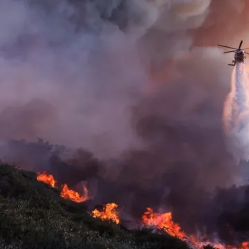 Flames engulf Southern California as crews battle to control Palisades Fire