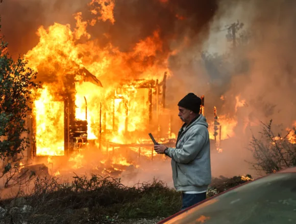 Families flee with prized possessions and minutes to spare