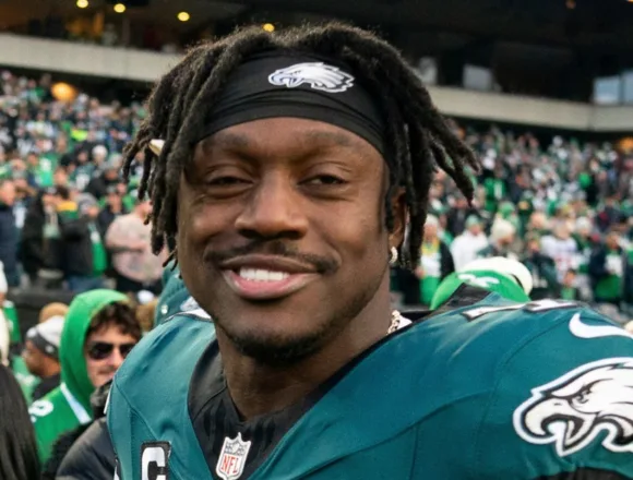 Eagles receiver A.J. Brown was reading a book on the sidelines of team’s playoff win
