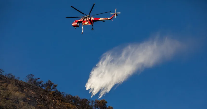 Hughes Fire containment grows after thousands forced to flee