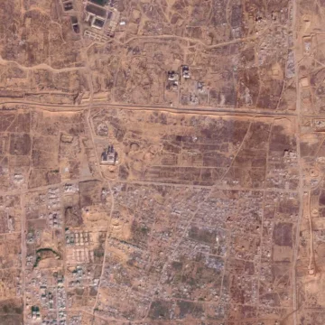 Israeli forces begin to withdraw from a key Gaza corridor, part of the ceasefire deal with Hamas