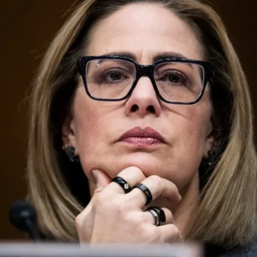 Kyrsten Sinema’s campaign spending report includes a Saudi hotel and Taylor Swift merch