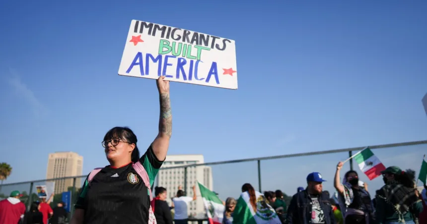 Marchers protesting planned deportations block major freeway in Los Angeles