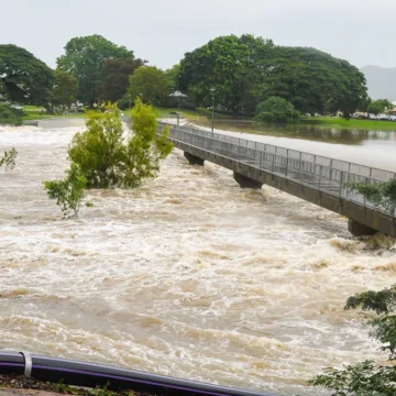 One dead, thousands urged to evacuate as Australia’s northeast battles floods