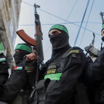 Hamas official says the militant group will release three hostages on Saturday
