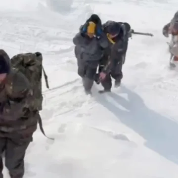 Russia says it rescues all 139 fishermen stranded on ice floe in Western Pacific sea