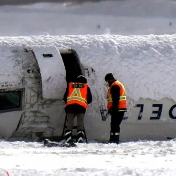 Two passengers sue Delta after plane rolls over during crash-landing in Toronto