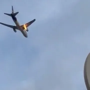 Videos show FedEx cargo plane’s engine on fire mid-flight