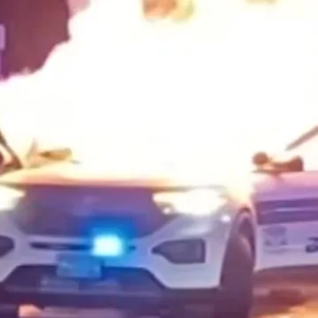 Crowd sets Boston police car on fire with fireworks