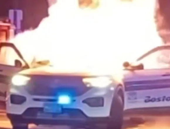 Crowd sets Boston police car on fire with fireworks