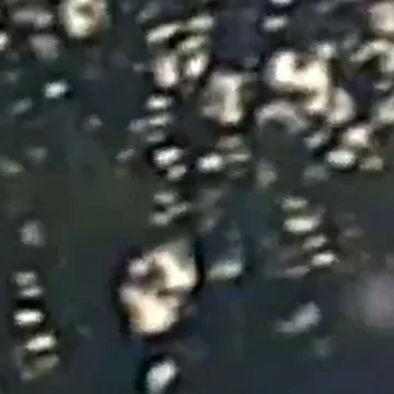 Dashcam video shows shots fired in high-speed car chase