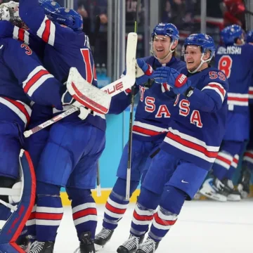 1771505083927_tdy_news_7a_oly_news_of_day_olympics_260219_1920x1080-b2z2lw.jpg Team USA Goes for Gold on the Ice on Day 14 of Winter Games