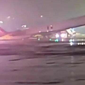 At least four injured in collision between plane and vehicle at NYC LaGuardia Airport