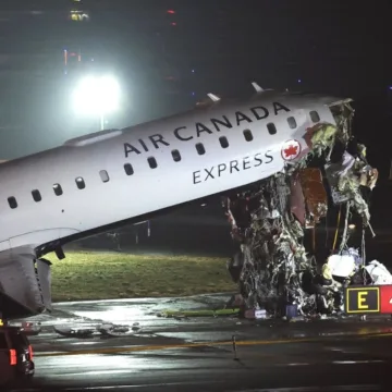 Canada Air Jet and Firetruck Collide at LaGuardia, Killing 2 Pilots