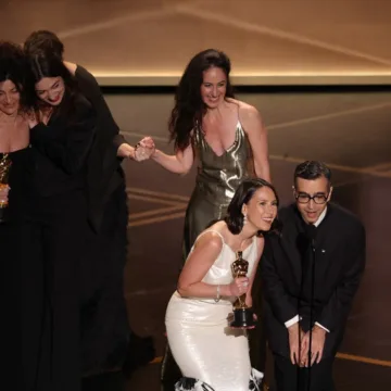 Rare Oscars tie goes to best live-action short film winners ‘The Singers,’ ‘Two People Exchanging Saliva’