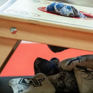 Quadruple amputee and cornhole pro accused of fatally shooting man while driving