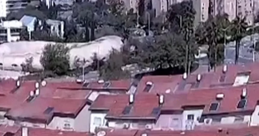 Video shows Iranian missile strike building in Israel
