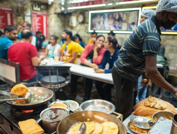 Indians line up for these flatbreads. But now gas is running short.