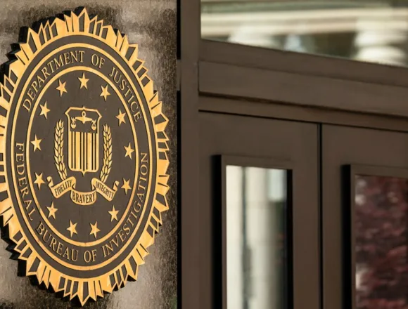 260408-doj-sign-gk-faacea.jpg First person convicted under law criminalizing intimate deepfakes