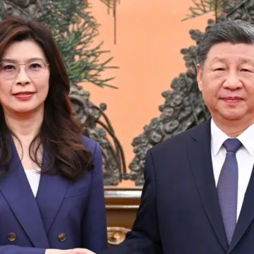 China’s Xi talks peace with Taiwan’s opposition leader even as Beijing raises military pressure