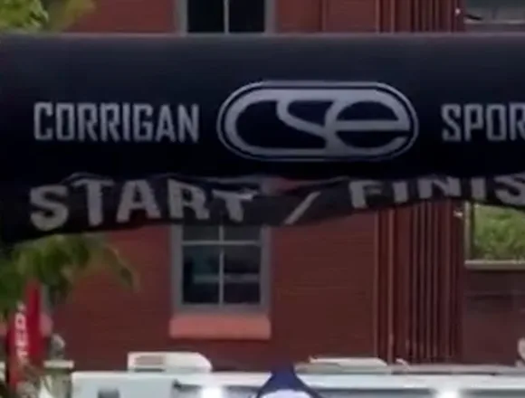 Runner speeds past Delaware marathon leader for photo finish