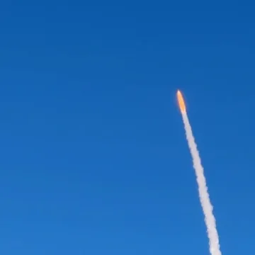 Artemis II launch captured by passenger on flight