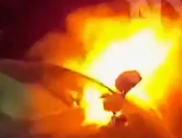 Three people rescued from a burning car in New York