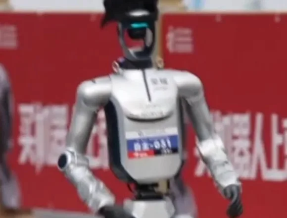 Robots take on humans in half marathon in China
